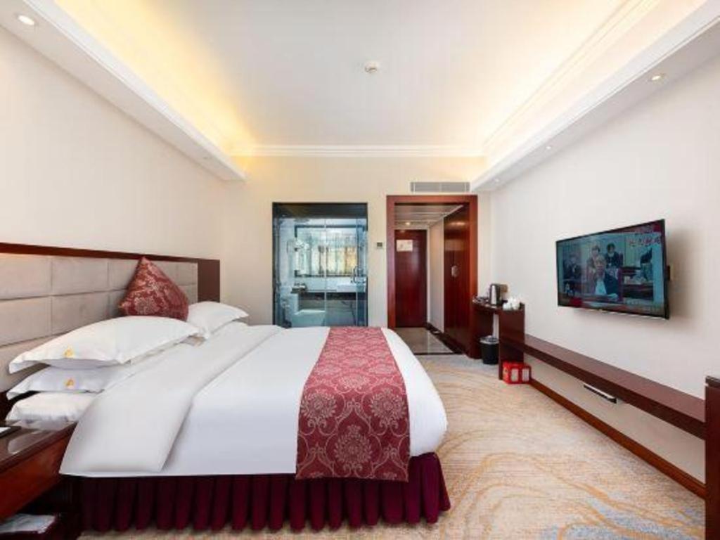 Overseas Chinese Hotel Csuhaj Kültér fotó