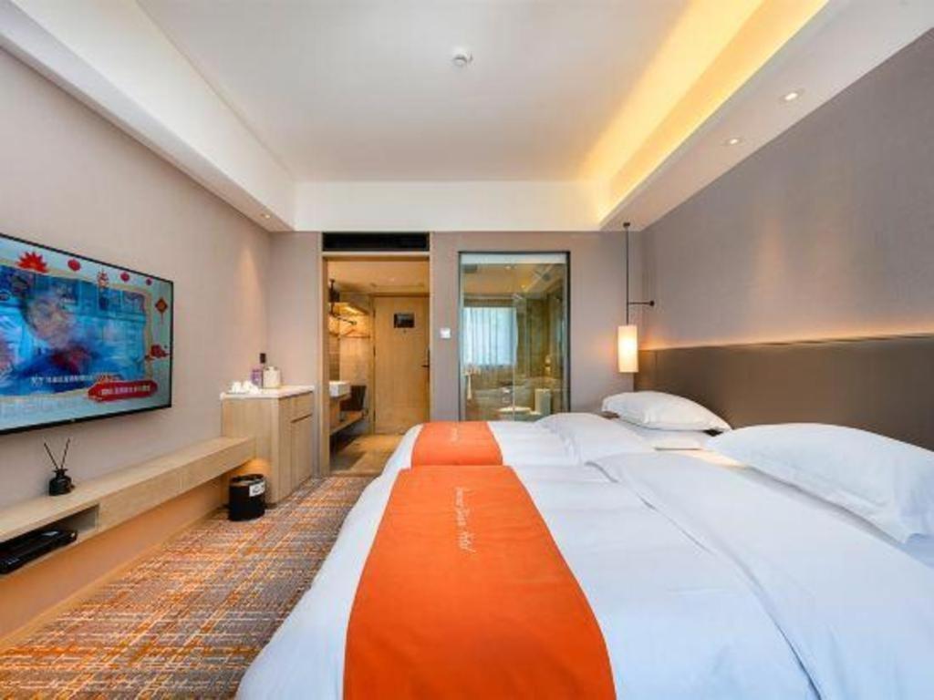 Overseas Chinese Hotel Csuhaj Kültér fotó