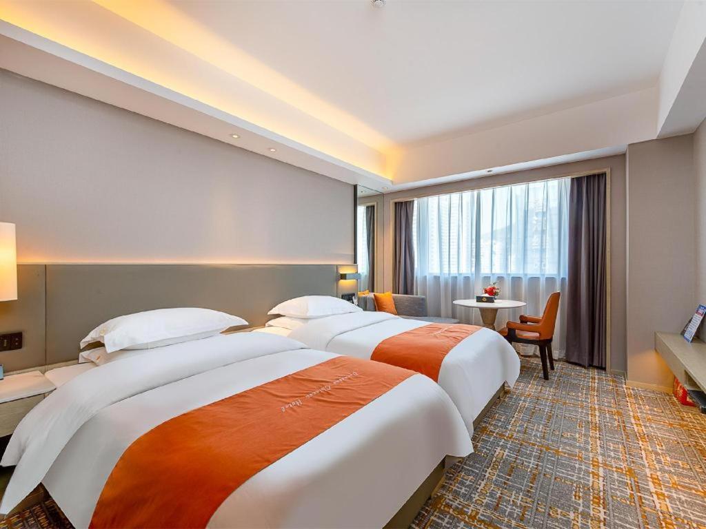 Overseas Chinese Hotel Csuhaj Kültér fotó