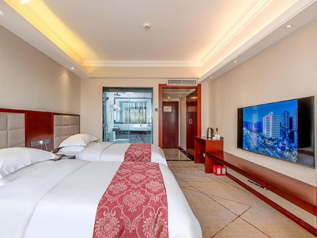 Overseas Chinese Hotel Csuhaj Kültér fotó