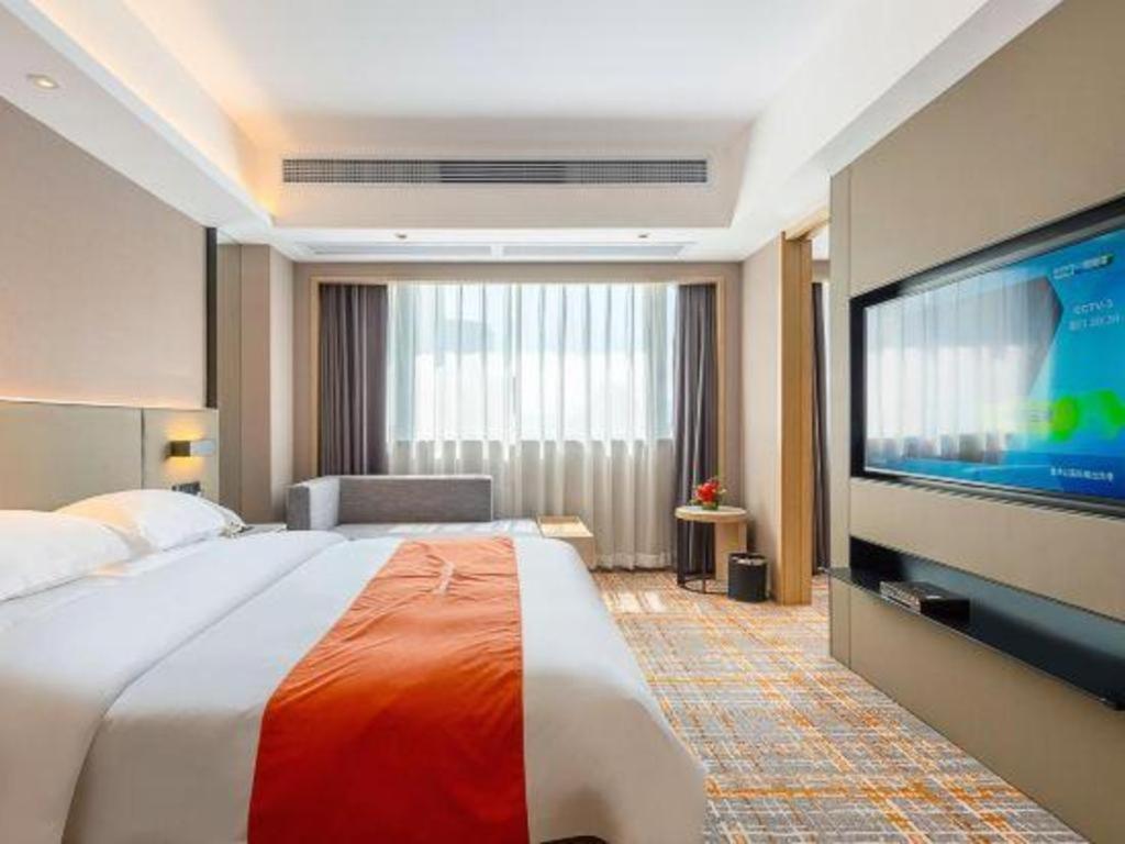 Overseas Chinese Hotel Csuhaj Kültér fotó