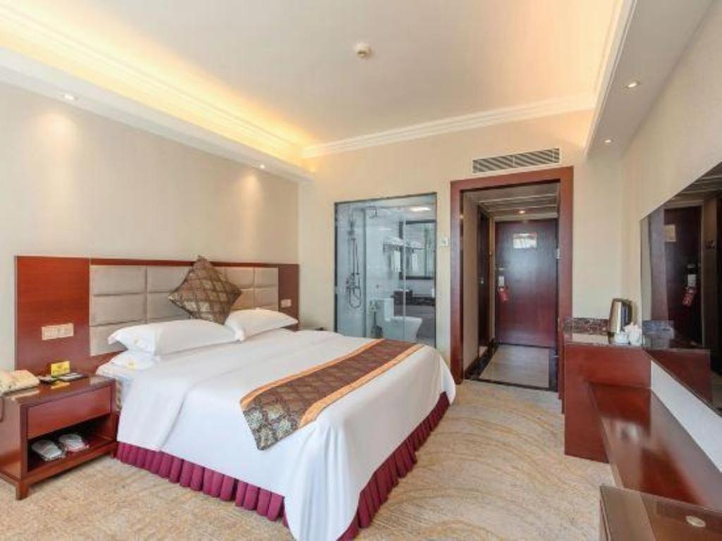 Overseas Chinese Hotel Csuhaj Kültér fotó