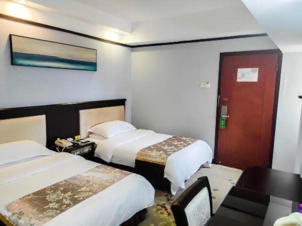 Overseas Chinese Hotel Csuhaj Kültér fotó