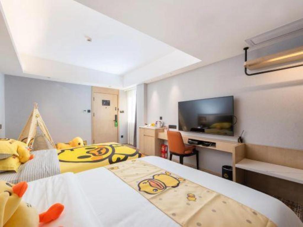 Overseas Chinese Hotel Csuhaj Kültér fotó