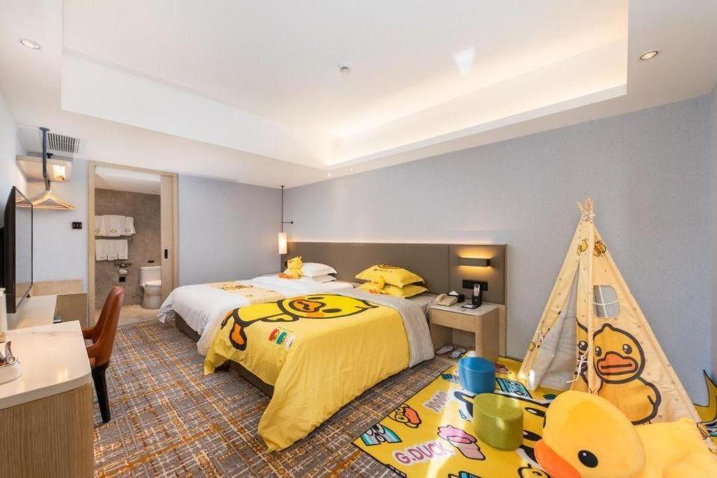 Overseas Chinese Hotel Csuhaj Kültér fotó