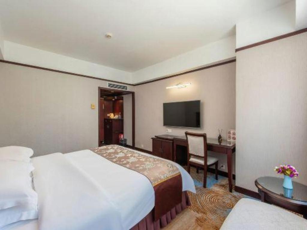 Overseas Chinese Hotel Csuhaj Kültér fotó