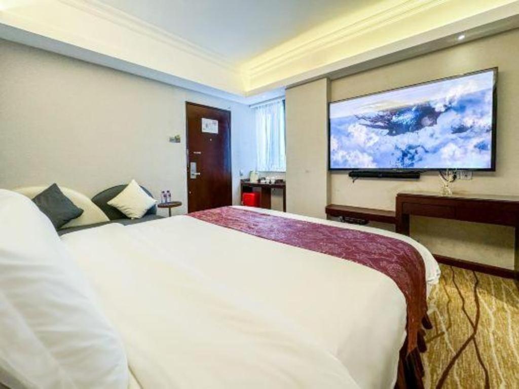 Overseas Chinese Hotel Csuhaj Kültér fotó