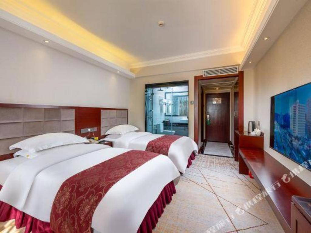 Overseas Chinese Hotel Csuhaj Kültér fotó