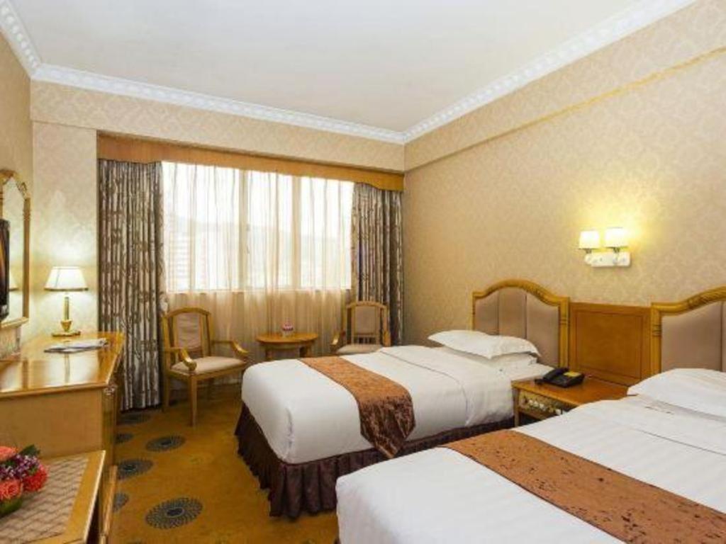 Overseas Chinese Hotel Csuhaj Kültér fotó